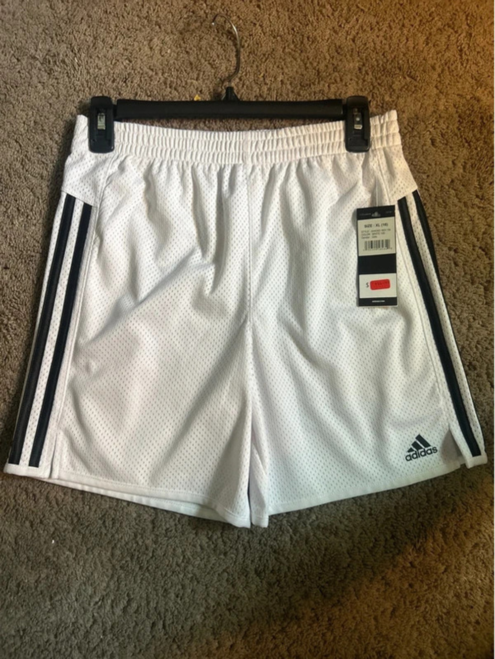 Girl's Adidas athletic shorts.